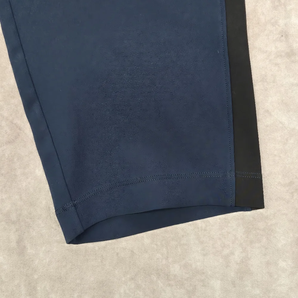Lululemon Athletica On the Fly Woven Navy with Black Track Stripe Pants